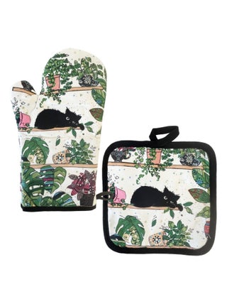 Gant et manique chaton dans les plantes