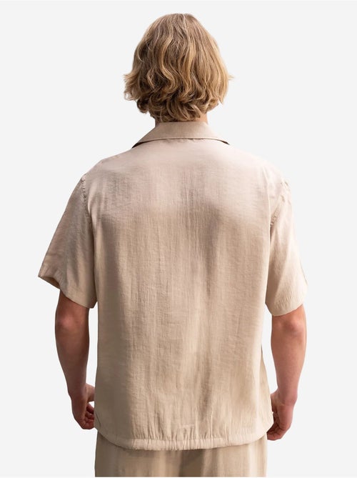 Giesto chemise tissée à manches courtes coupe décontractée avec détail nouée - Kiabi Giesto chemise tissée à manches courtes coupe décontractée avec détail nouée - Kiabi