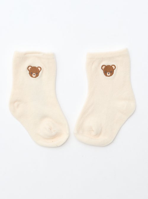 GIFTBOX salopette longue en tricot + body + lange double gaze + chaussettes - Kiabi