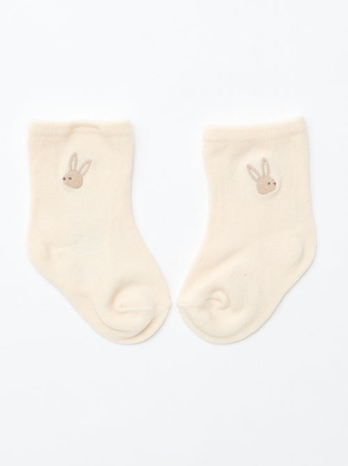 GIFTBOX salopette longue en tricot + body + lange double gaze + chaussettes - Kiabi