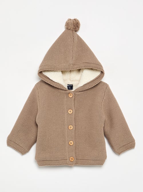Gilet au point mousse doublé à capuche - Kiabi Gilet au point mousse doublé à capuche - Kiabi