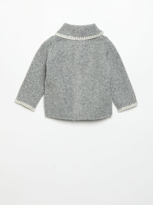 Gilet avec bords fantaisie contrastés - Kiabi Gilet avec bords fantaisie contrastés - Kiabi