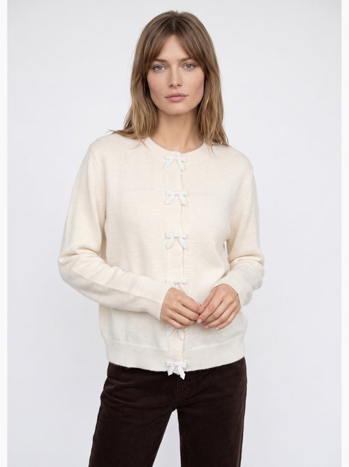 Gilet avec détails n¿ud perles de rocaille - afibel - Kiabi Gilet avec détails n¿ud perles de rocaille - afibel - Kiabi
