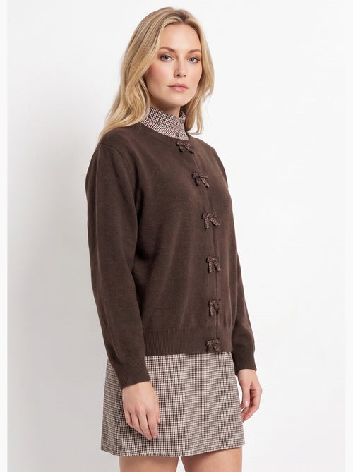 Gilet avec détails n¿ud perles de rocaille - afibel - Kiabi Gilet avec détails n¿ud perles de rocaille - afibel - Kiabi