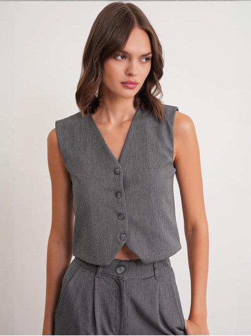 Gilet boutonné à col en v mixray - Kiabi Gilet boutonné à col en v mixray - Kiabi