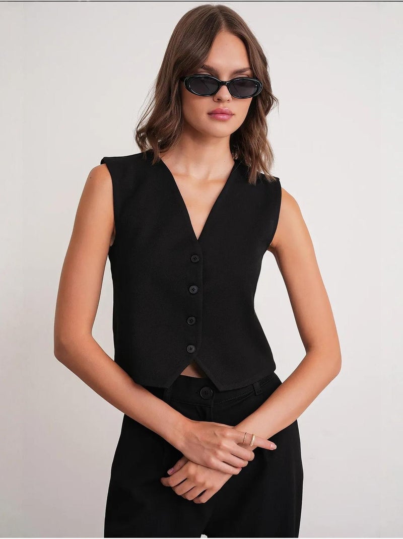 Gilet boutonné à col en v mixray Noir - Kiabi