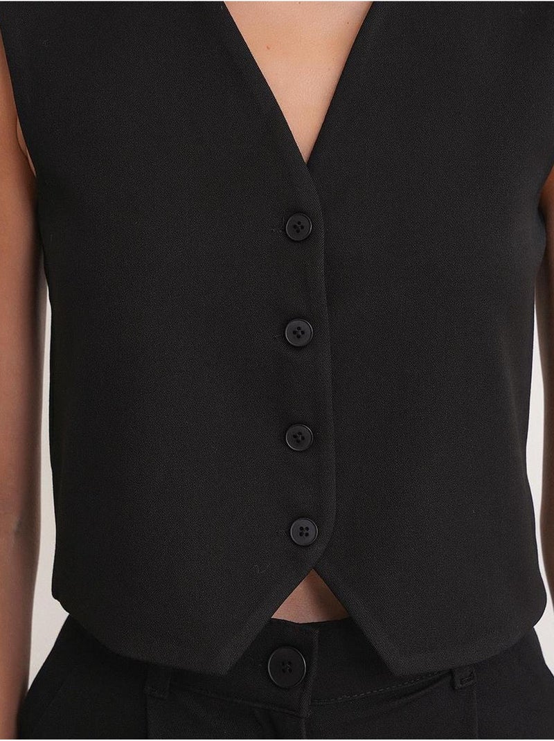 Gilet boutonné à col en v mixray Noir - Kiabi