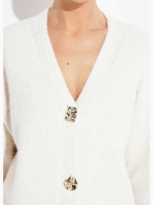 Gilet chaud avec boutons bijou en métal - afibel - Kiabi Gilet chaud avec boutons bijou en métal - afibel - Kiabi