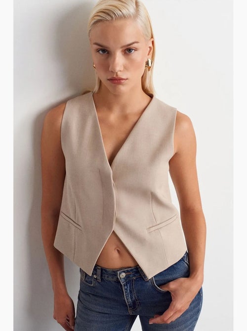 Gilet court boutonné dilvin - Kiabi Gilet court boutonné dilvin - Kiabi
