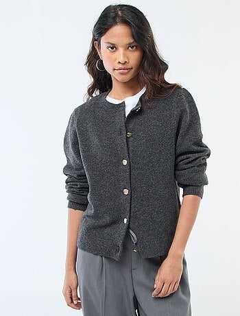 Gilet en maille avec boutons dorés