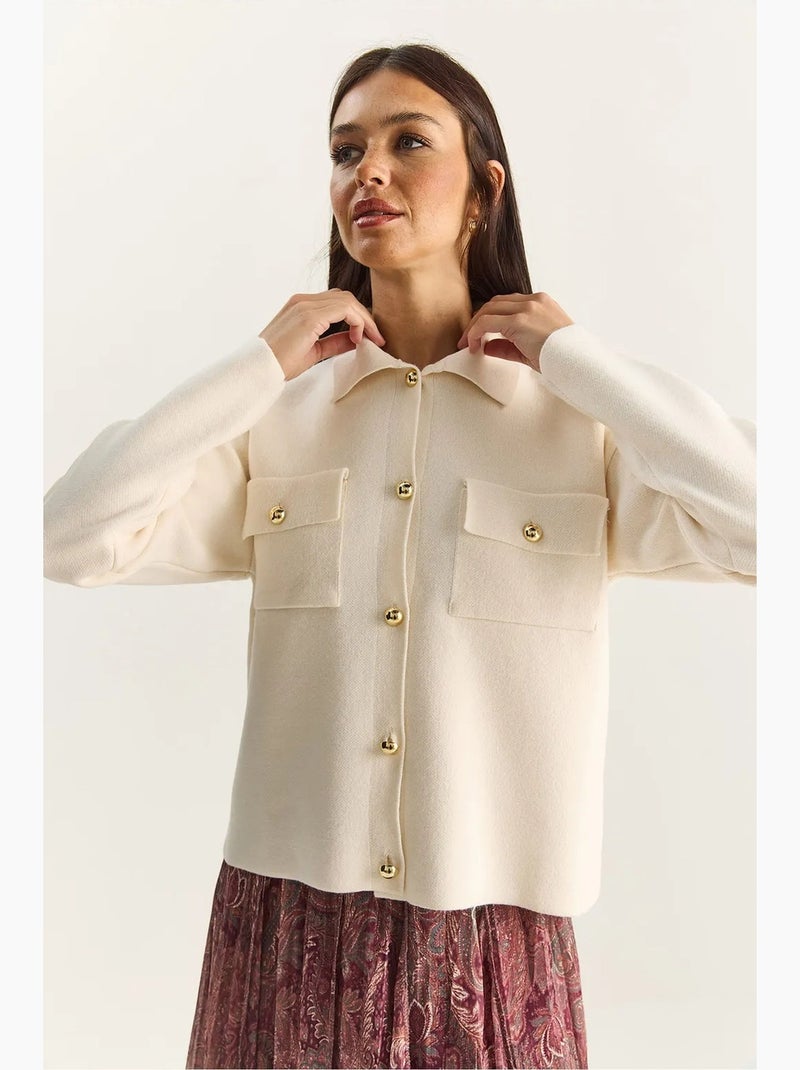 Gilet en maille côtelée avec col polo et fermeture boutonnée lucci Crème - Kiabi