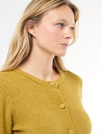 Gilet en maille fine jauge à base volantée