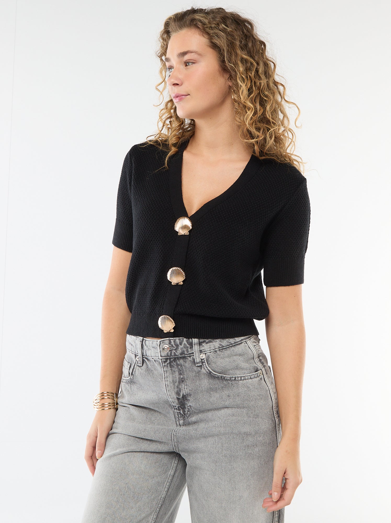 Gilet manches courtes à boutons fantaisies