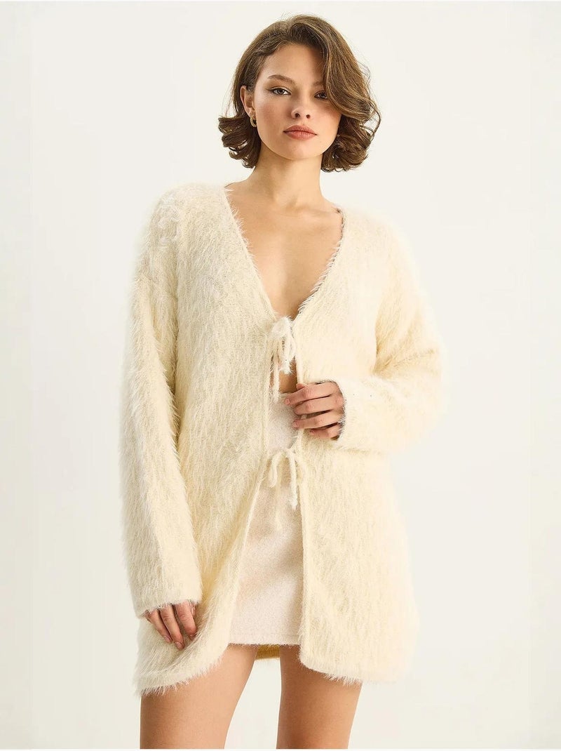 Gilet mi-long texturé à col en v et fermeture à nouer lucci Crème - Kiabi