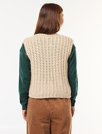 Gilet sans manches avec ouverture à larges boutons martelés