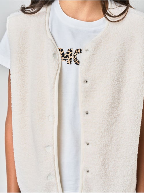 Gilet sans manches fille au toucher doux et texturé 'deeluxe' - Kiabi Gilet sans manches fille au toucher doux et texturé 'deeluxe' - Kiabi