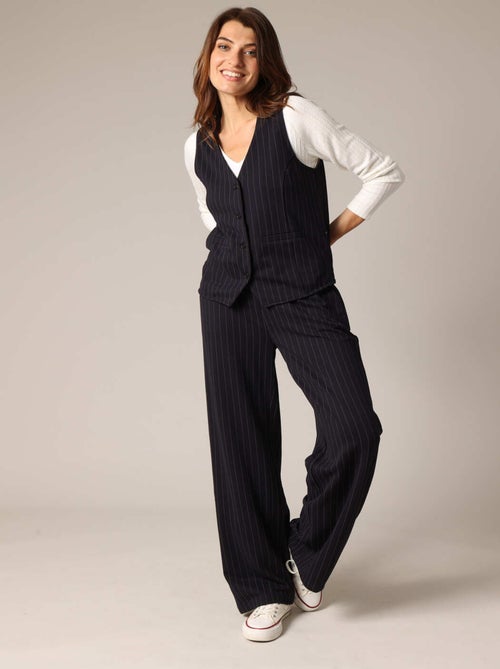 Gilet sans manches pour femme en tissu rayé, avec un style couture audacieux
 'Deeluxe' - Kiabi