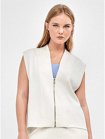 Gilet sportif double doux avec fermeture éclair frontale en couleur beige