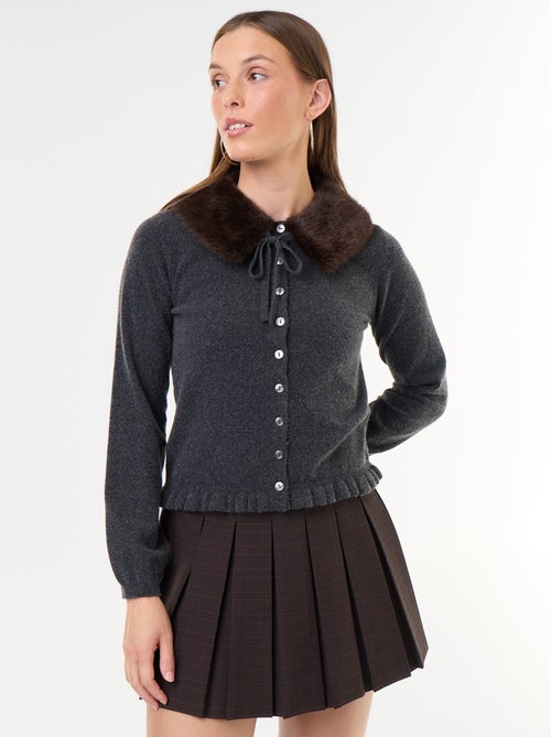 Gilet uni avec fausse fourrure au col - Kiabi Gilet uni avec fausse fourrure au col - Kiabi
