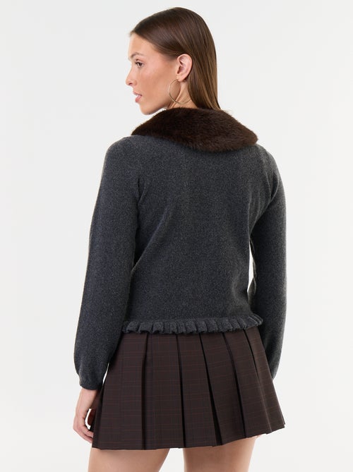 Gilet uni avec fausse fourrure au col - Kiabi Gilet uni avec fausse fourrure au col - Kiabi