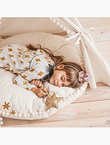 Grand coussin de sol avec pompons