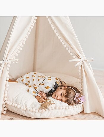 Grand coussin de sol avec pompons