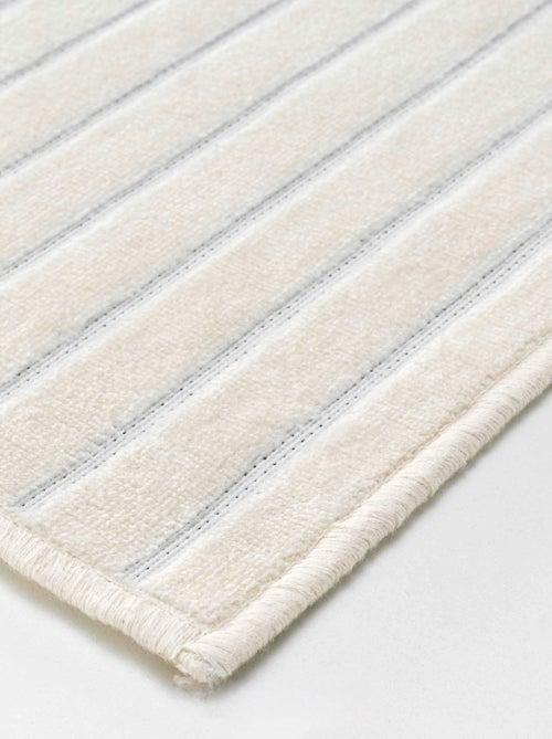 Grand tapis trait en relief - Kiabi