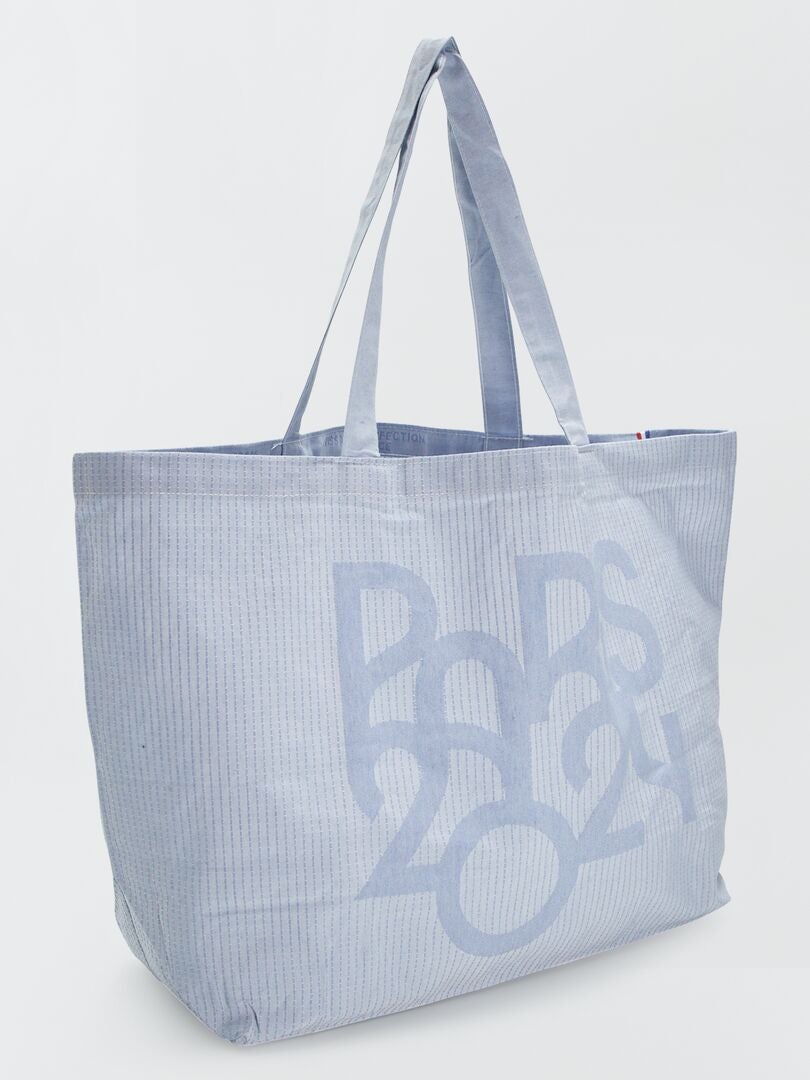 Grand Tote Bag Paris 2024 Bleu Ciel Kiabi 9 00   Grand Tote Bag   Paris 2024 Bleu Ciel Auf08 4 Frb4 