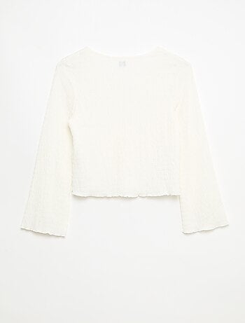 Haut col V en maille gaufrée avec boutons dorés