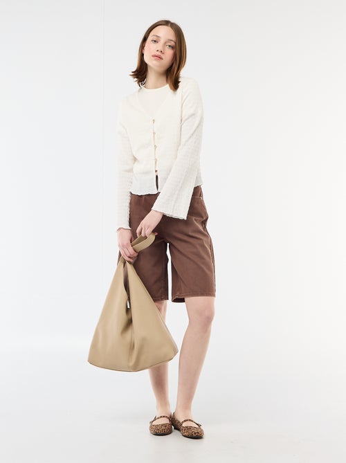 Haut col V en maille gaufrée avec boutons dorés - Kiabi Haut col V en maille gaufrée avec boutons dorés - Kiabi