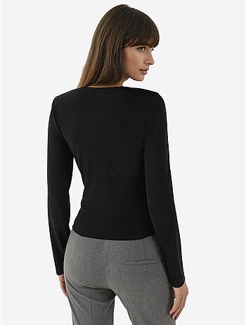 Haut tricoté à manches longues et col asymétrique
