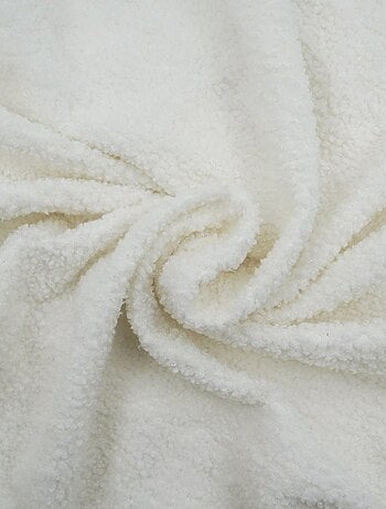 Housse de canapé extensible en bouclette polyester coloris blanc