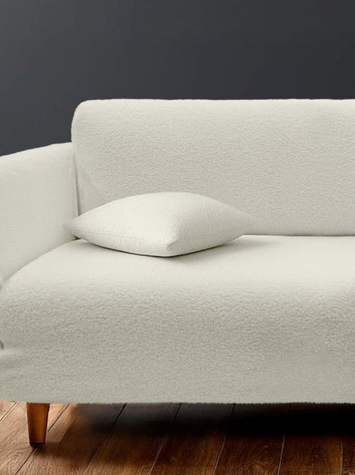 Housse de canapé extensible en bouclette polyester coloris blanc - Kiabi Housse de canapé extensible en bouclette polyester coloris blanc - Kiabi