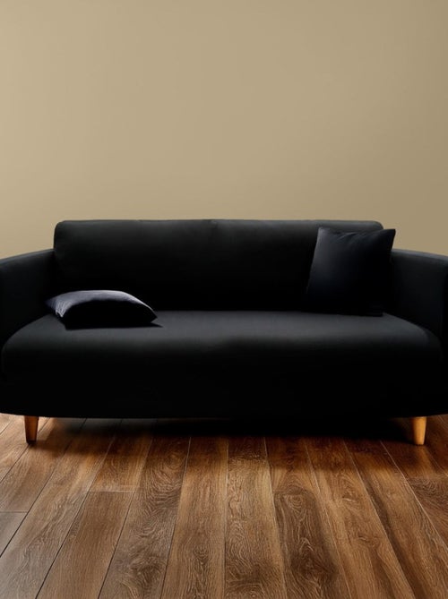 Housse de canapé extensible en polyester coloris noir - Kiabi
