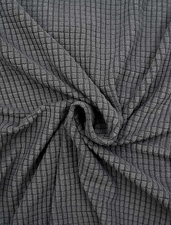 Housse de canapé extensible en polyester gaufré coloris anthracite