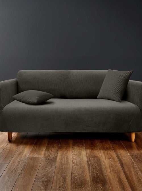Housse de canapé extensible en polyester gaufré coloris anthracite - Kiabi Housse de canapé extensible en polyester gaufré coloris anthracite - Kiabi