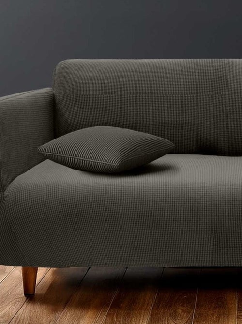 Housse de canapé extensible en polyester gaufré coloris anthracite - Kiabi Housse de canapé extensible en polyester gaufré coloris anthracite - Kiabi