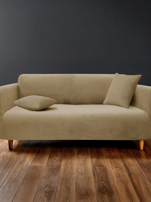 Housse de canapé extensible en polyester gaufré coloris beige - Kiabi Housse de canapé extensible en polyester gaufré coloris beige - Kiabi