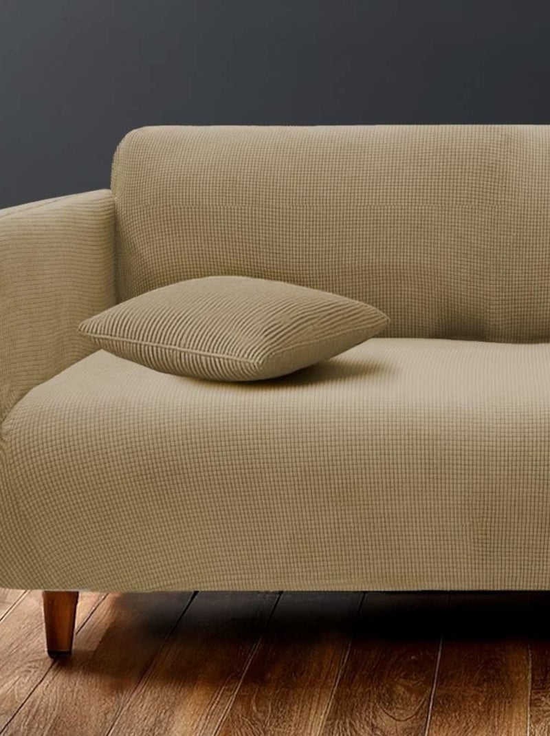 Housse de canapé extensible en polyester gaufré coloris beige Beige - Kiabi