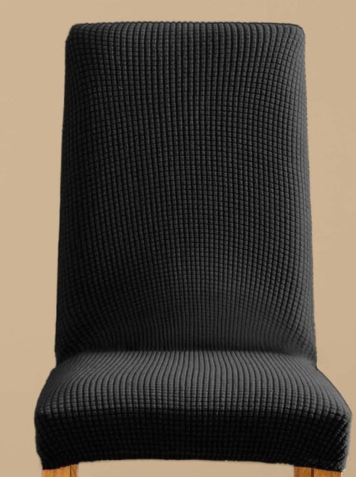 Housse de chaise extensible en polyester gaufré coloris noir - Kiabi Housse de chaise extensible en polyester gaufré coloris noir - Kiabi