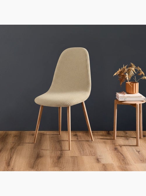 Housse de chaise scandinave extensible en polyester gaufré - Kiabi Housse de chaise scandinave extensible en polyester gaufré - Kiabi
