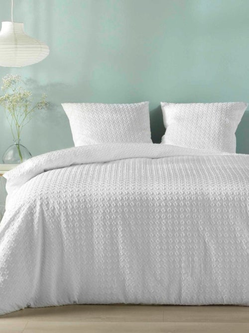 Housse de couette 240x220 + 2 taies gaufrées blanche - Kiabi Housse de couette 240x220 + 2 taies gaufrées blanche - Kiabi