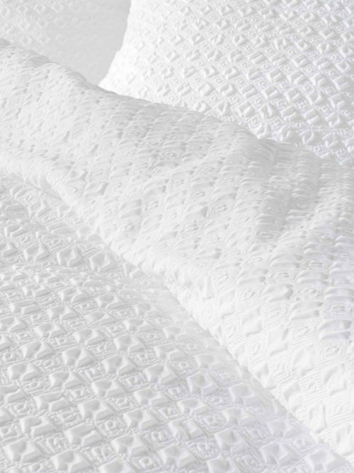 Housse de couette 240x220 + 2 taies gaufrées blanche - Kiabi Housse de couette 240x220 + 2 taies gaufrées blanche - Kiabi
