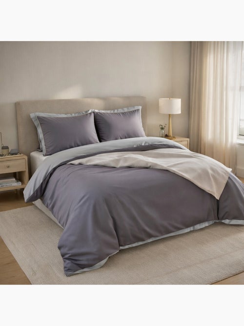 Housse de couette réversible en 100% percale de coton 70 fils - Kiabi Housse de couette réversible en 100% percale de coton 70 fils - Kiabi