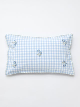Housse de coussin brodée