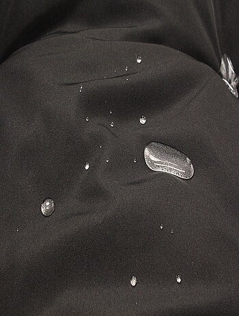 JANE Fauteuil œuf sur pied en résine gris effet rotin