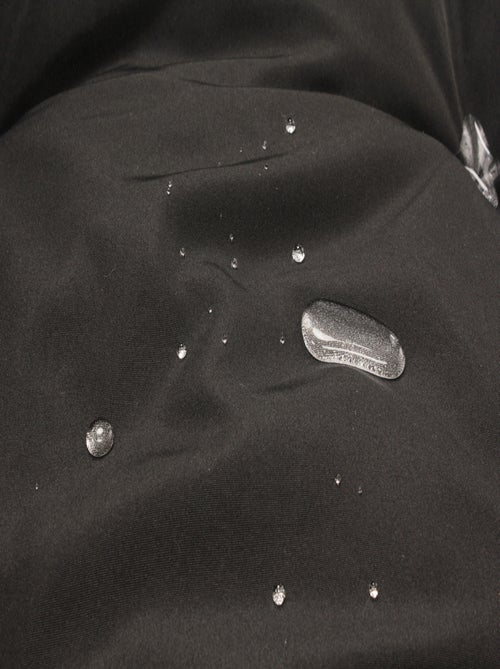 JANE Fauteuil œuf sur pied en résine noir effet rotin - Kiabi