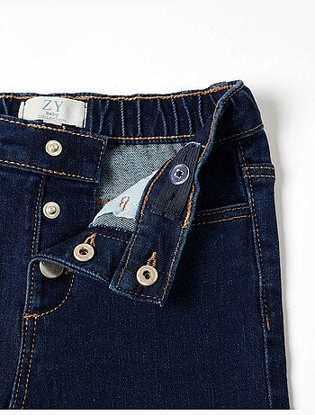 Jean à jambe large avec boutons-pression