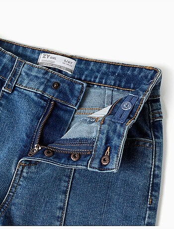 Jean à jambe large avec ourlets effilochés