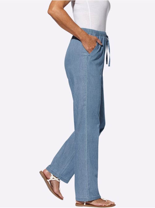 Jean à la coupe ample avec ceinture élastique et poches - Taille standard - Moda Vilona - Kiabi Jean à la coupe ample avec ceinture élastique et poches - Taille standard - Moda Vilona - Kiabi